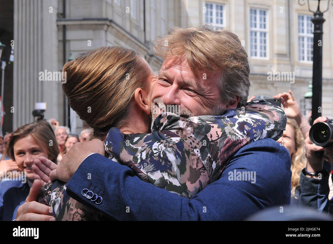 Copenhagen /Denmark./ 27June 2019/ Denmark's new prime minister social democrat kisses and hugs her boy friend Bo Tengberg after meeting with queen at infron the Amalienborg palace in danish capital, Mette Frederiksen is single mother wih two teen children, PM is 42years old female and 24 years she came in danish parliament as social democrat and  she has held weveral minter post in past social democrat got. Mette Frederisksen greets her boy friends with hugs and kiss. . (Photo..Francis Dean / Deanpictures. Stock Photo