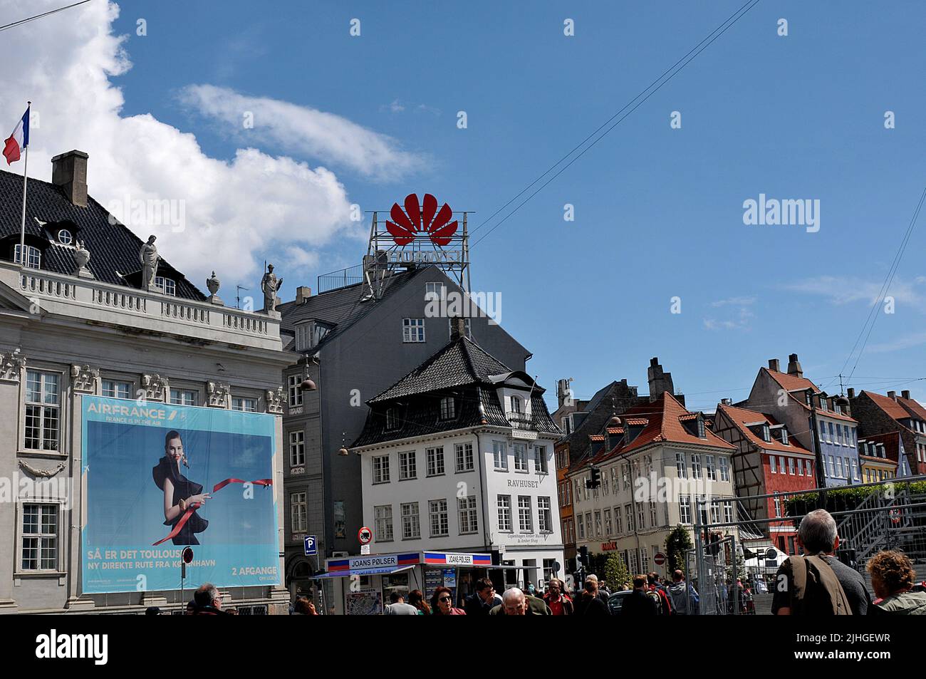 Copenhagen /Denmark./ 09 June 2019/ Huge billboard with chiense Huawei compnay at corner onf Nyhavn in danish capital over kongens nytorv . (Photo..Francis Dean / Deanpictures. Stock Photo