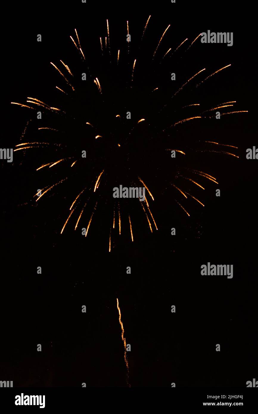 slightly unfocused collection of fireworks against black background, can be used as an overlay Stock Photo