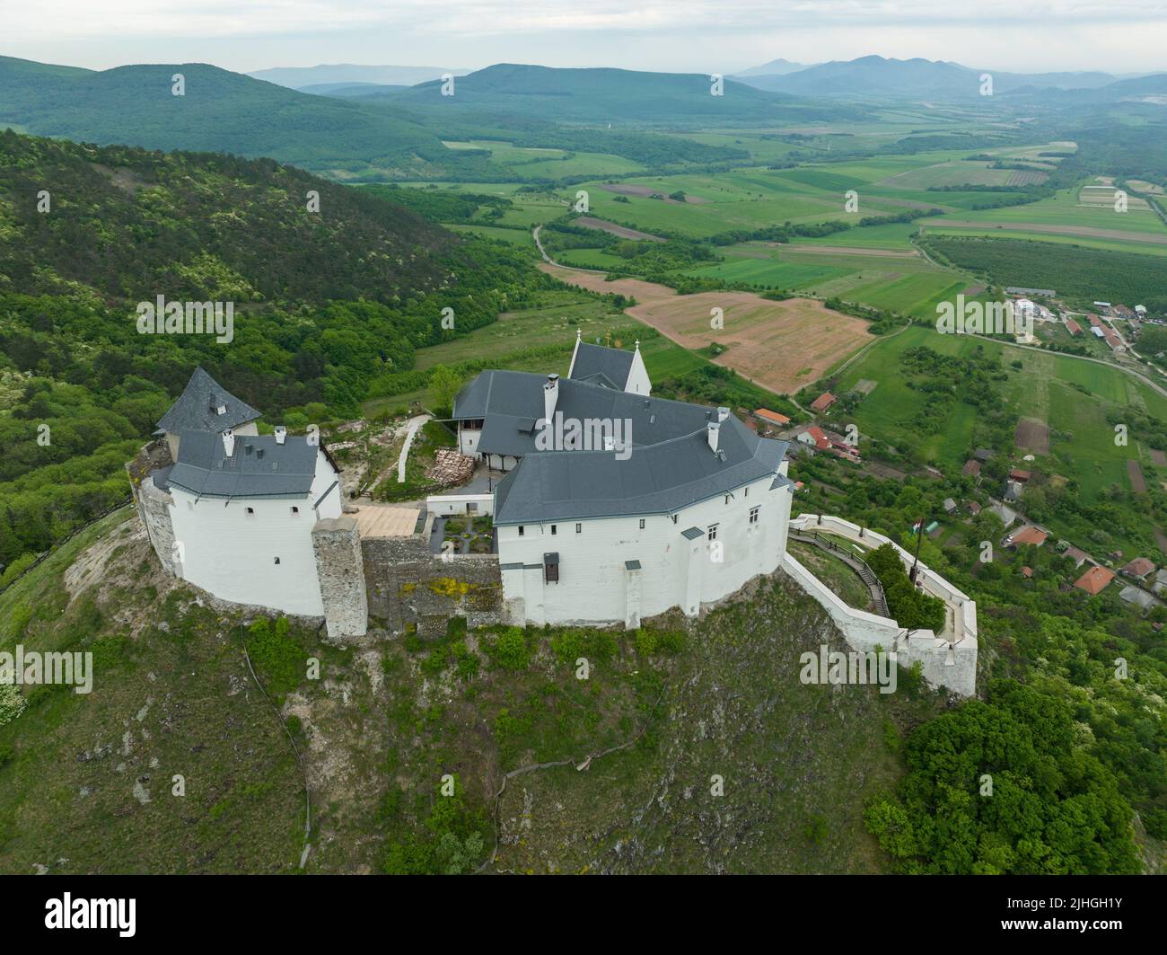 Aerial View Of A Medieval Castle On A Hilltop In Fuzer, Hungary Stock