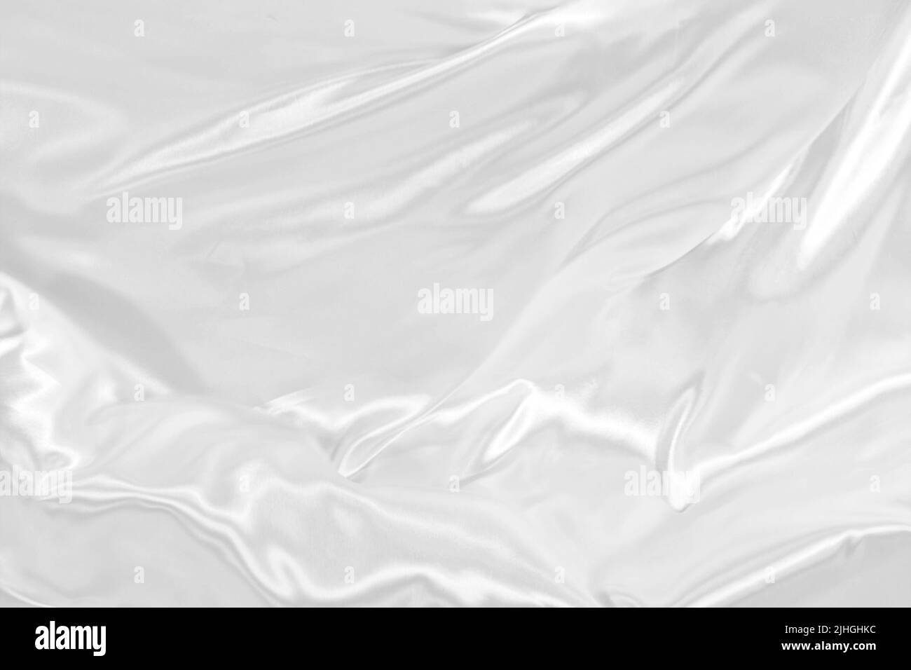 white silk or satin luxury cloth texture background can use as wedding backdrop elegant wallpaper design Stock Photo