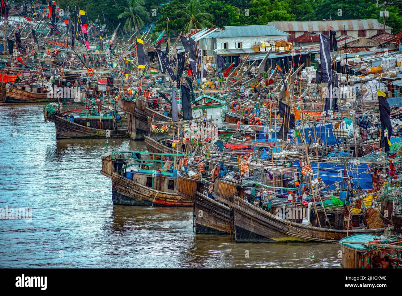 Fishing boats with colorful flags on them, Kuakata, Bangladesh Stock