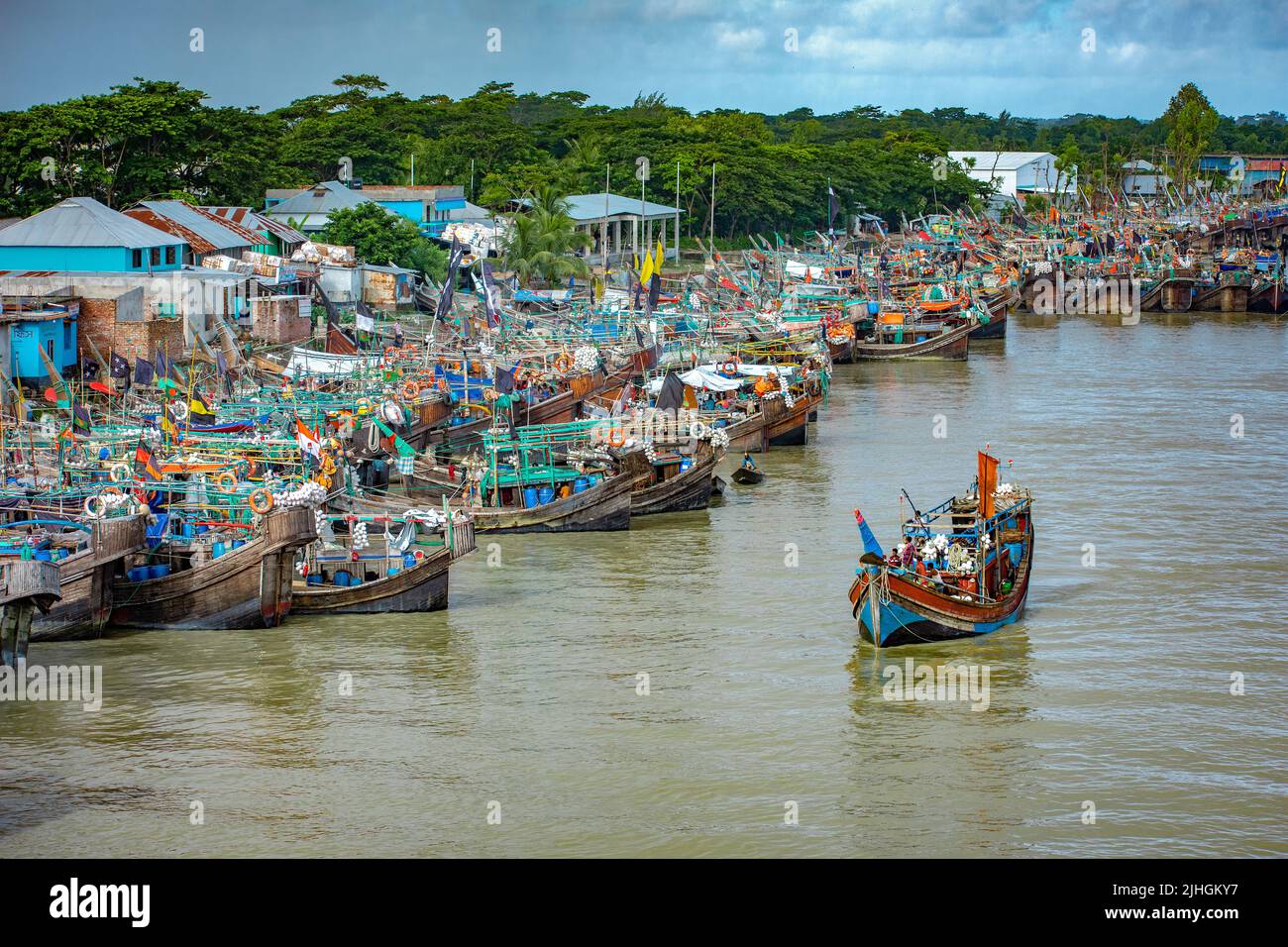 Fishing boats with colorful flags on them, Kuakata, Bangladesh Stock