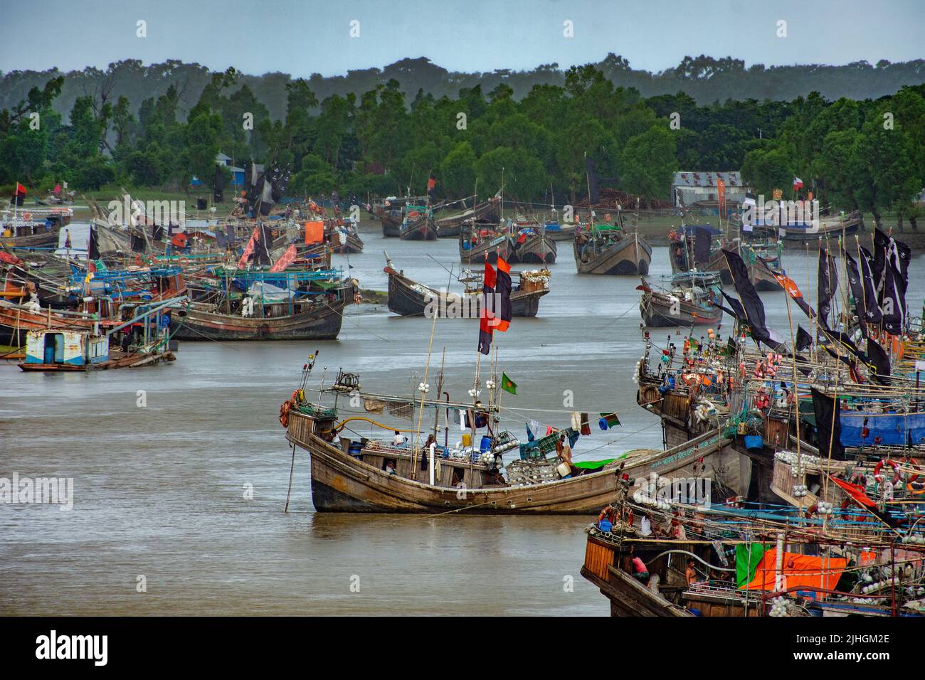 Fishing boats with colorful flags on them, Kuakata, Bangladesh Stock