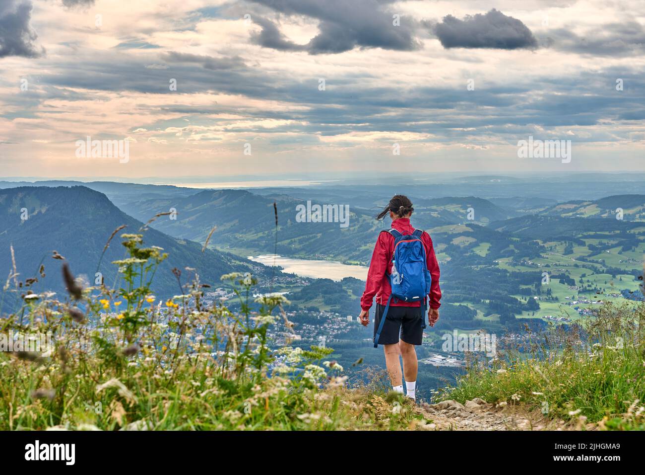 nice senior woman hiking at Mount Gruenten in the Allgaeu Alps with ...