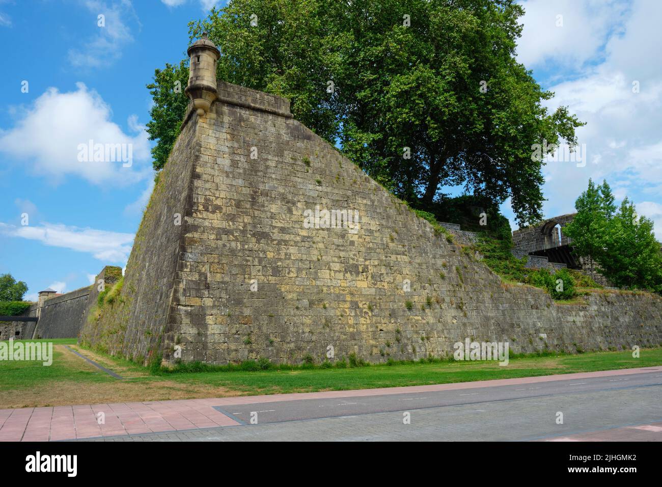 the Baluarte de la Reina bastion in Hondarribia, in the Basque Country, Spain, and a damaged section of the ramparts, that suffered intense attacks in Stock Photo
