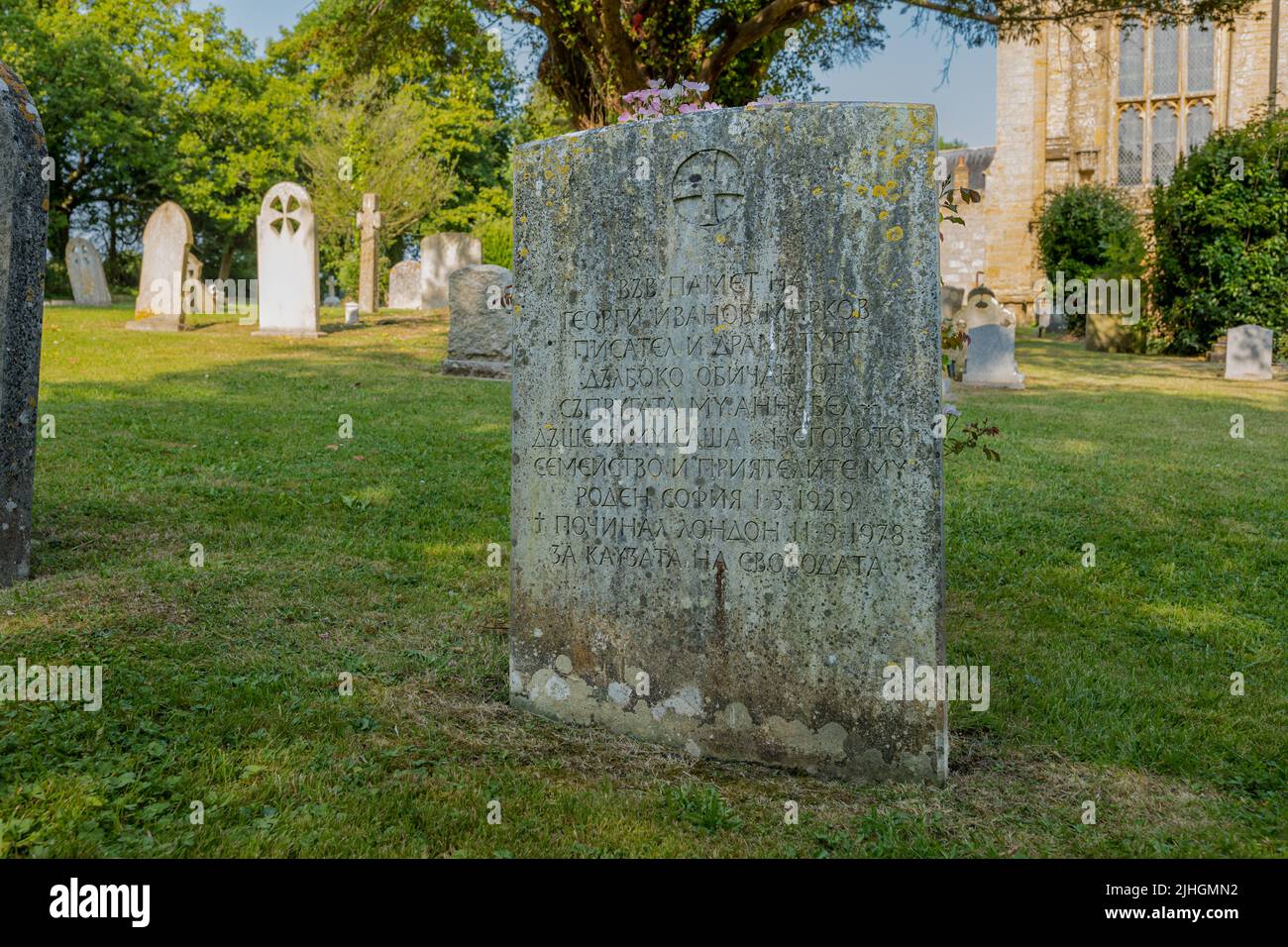 Georgi Markov grave in cemetery with Cyrillic script, Bulgarian dissident, Whitchurch Canonicorum churchyard, Dorset, England, UK Stock Photo