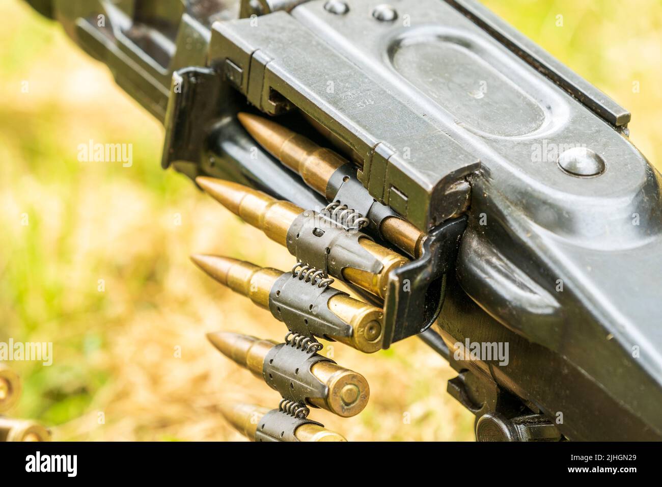 Second world war German MG34 machine gun. Detail showing the Gurt 34 metallic-link ammunition belt and the feed into the machine gun. Stock Photo