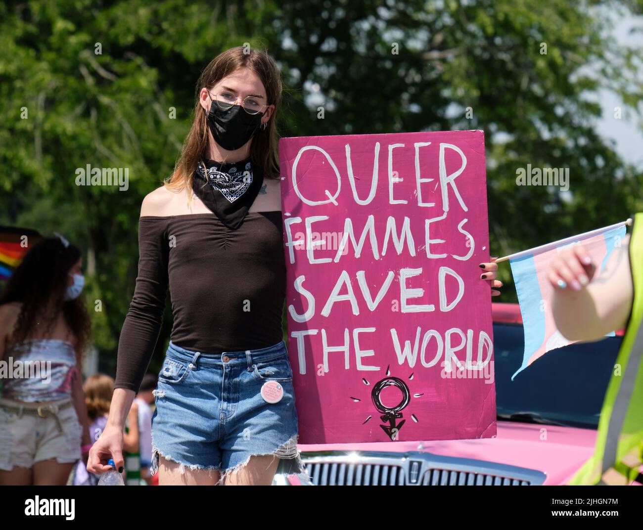 Halifax Pride Parade- Participant with sign ' Queer Femmes Saved the World' Stock Photo