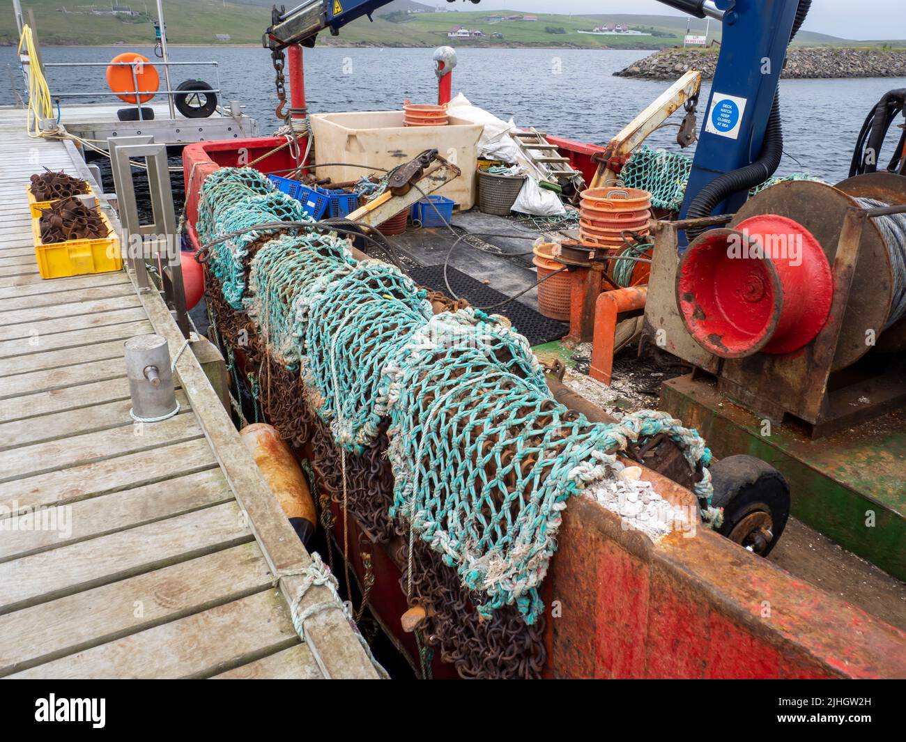 A scallop dredger at Skeld, Shetland, Scotland, UK. Stock Photo