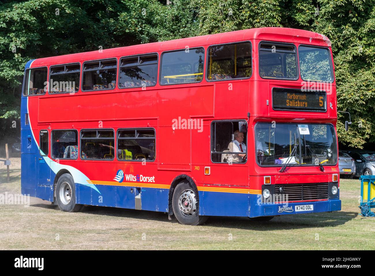 A vintage Wilts & Dorset Leland double-decker bus with red and blue livery at a transport event in Hampshire, England, UK Stock Photo