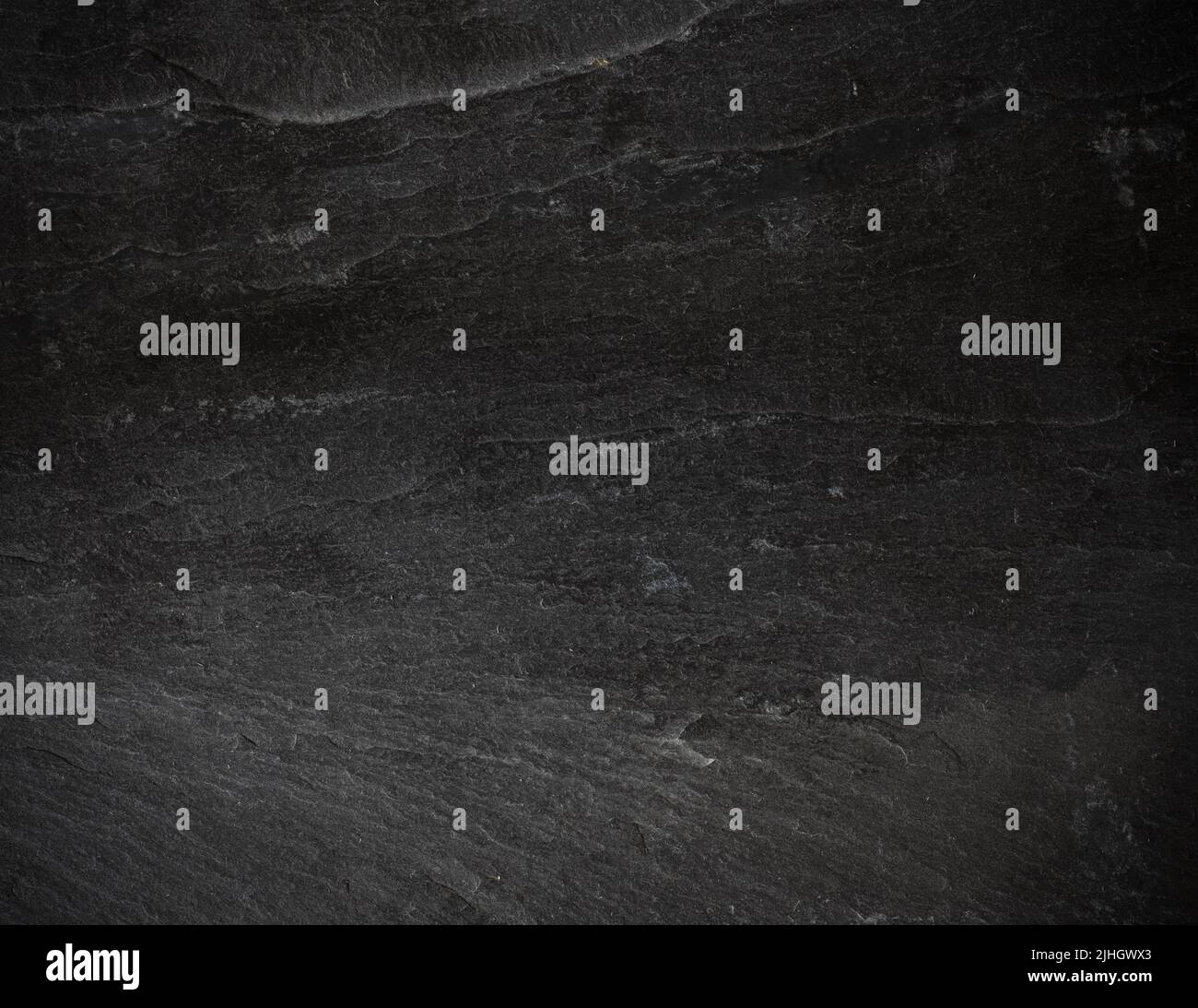 Black empty slate board with vignette for texture or background. Stock Photo