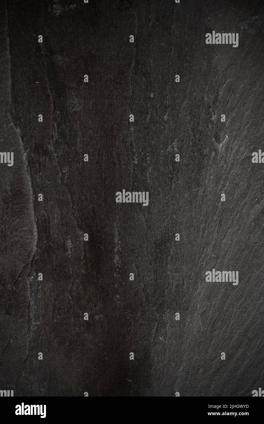 Black empty slate board with vignette for texture or background. Stock Photo