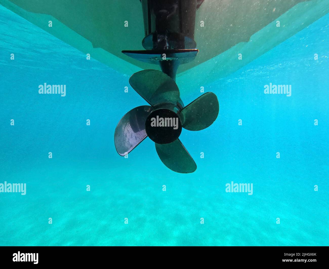 underwater shot of a propeller of a motor boat in the sea Stock Photo