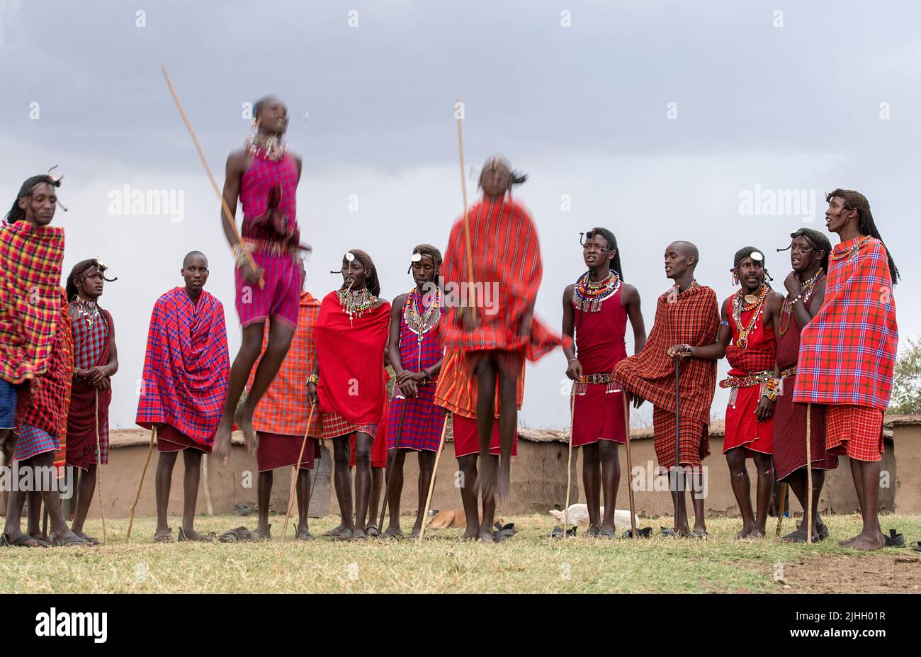 Maasai people preforming the traditional jumping dance in a Maasai village in Maasai Mara, Kenya. Stock Photo
