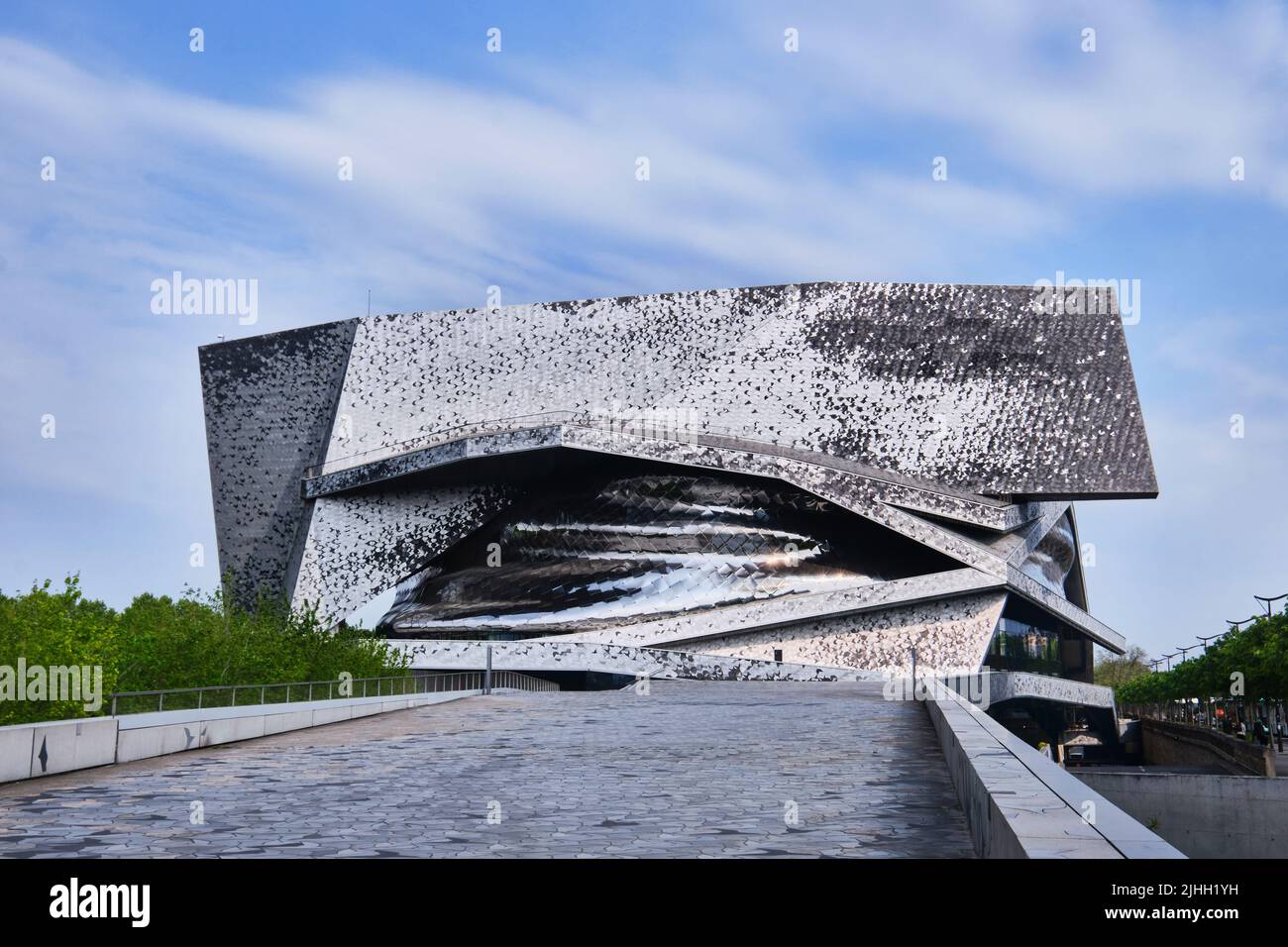 Paris, France - May 4, 2022: View of Paris Philharmonic (Philharmonie de Paris) and facade details in Parc de la Villette. Designed by Jean Nouvel. Co Stock Photo