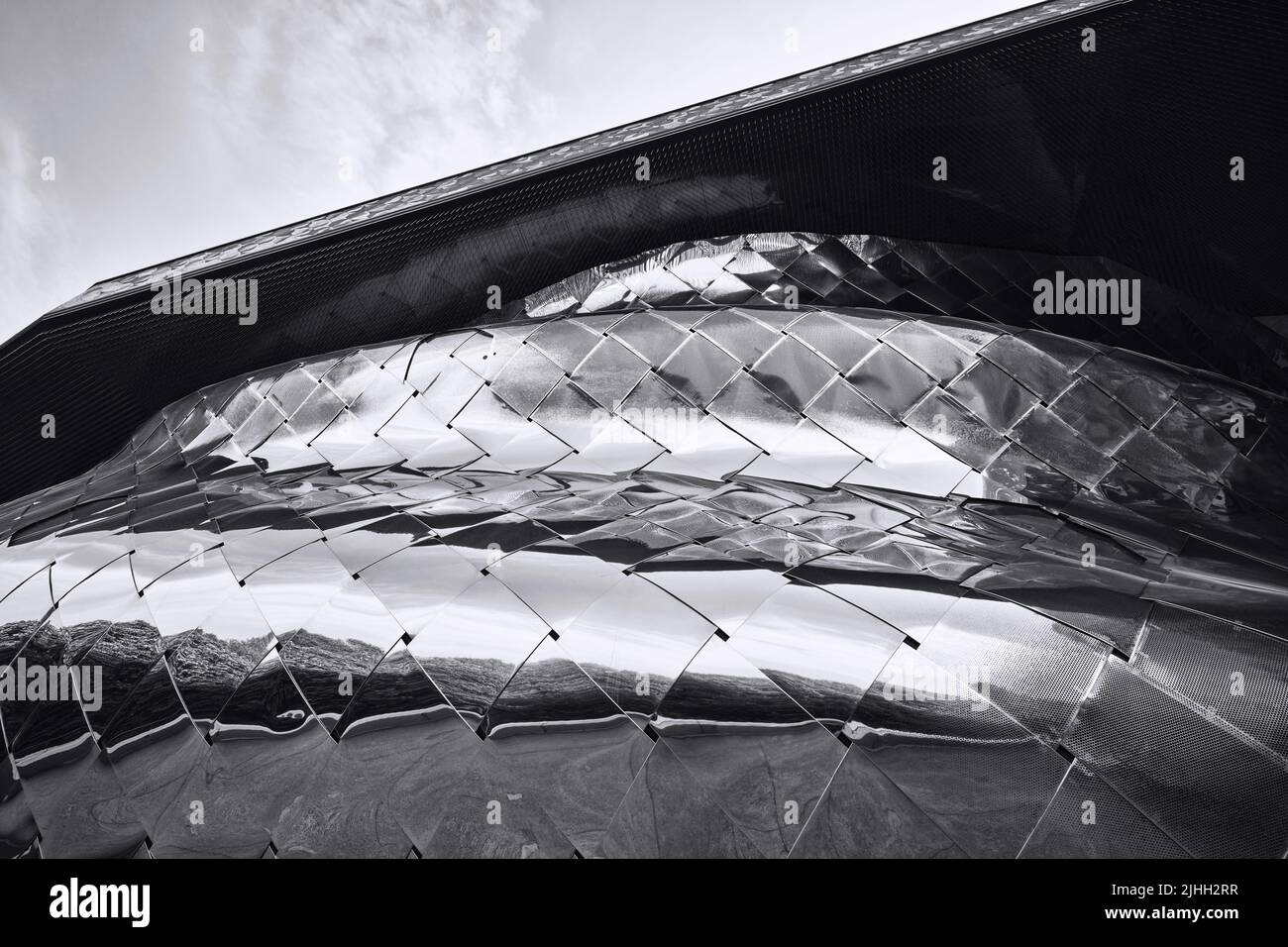 Paris, France - May 4, 2022: View of Paris Philharmonic (Philharmonie de Paris) and facade details in Parc de la Villette. Designed by Jean Nouvel. Co Stock Photo