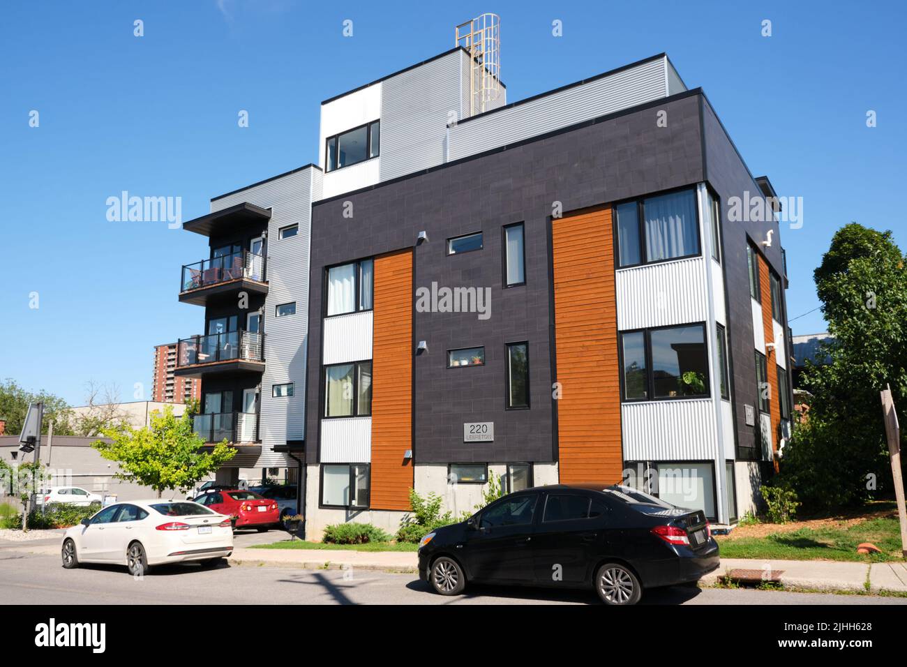 Three or four story high apartment complex an example of buildings