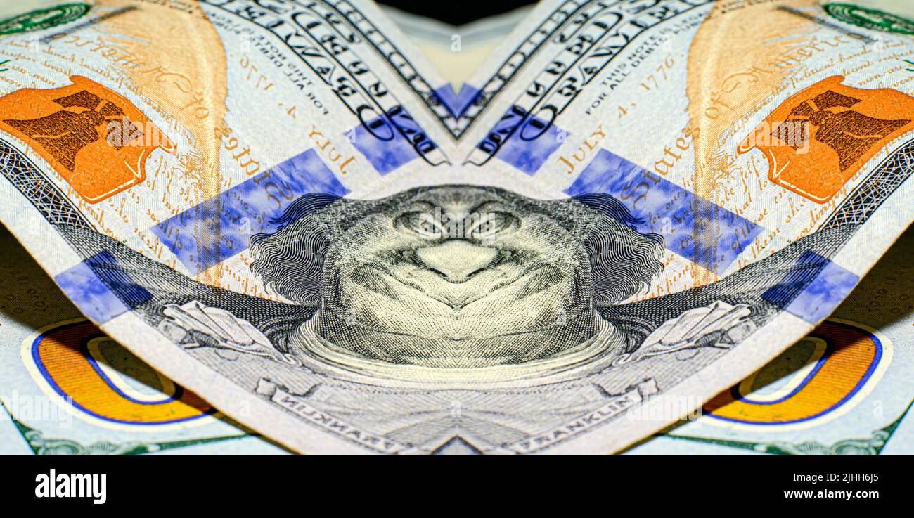 Money Caricature Of Benjamin Franklin on 100 dollar bill Stock Photo