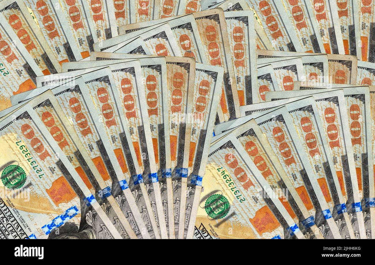 100 Dollar Bills Covering Background Stock Photo