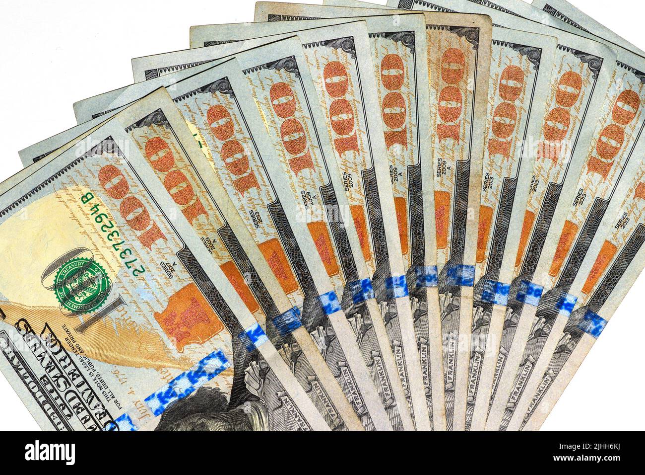 100 Dollar Bills Fanned on White Background Stock Photo