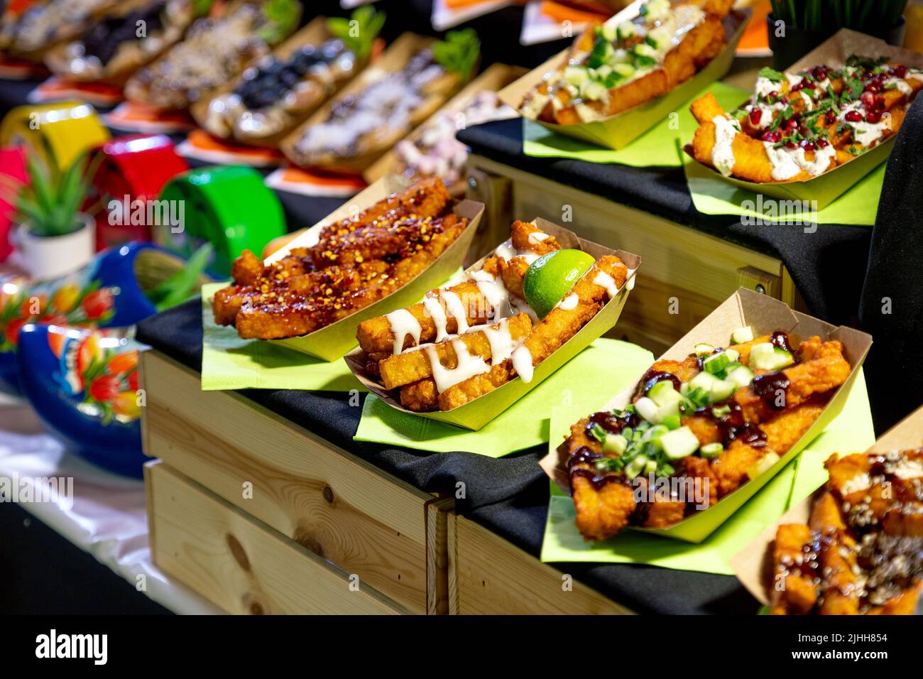 Selection of halloumi fries with toppings at Upmarket Brick Lane food market, London, UK Stock Photo