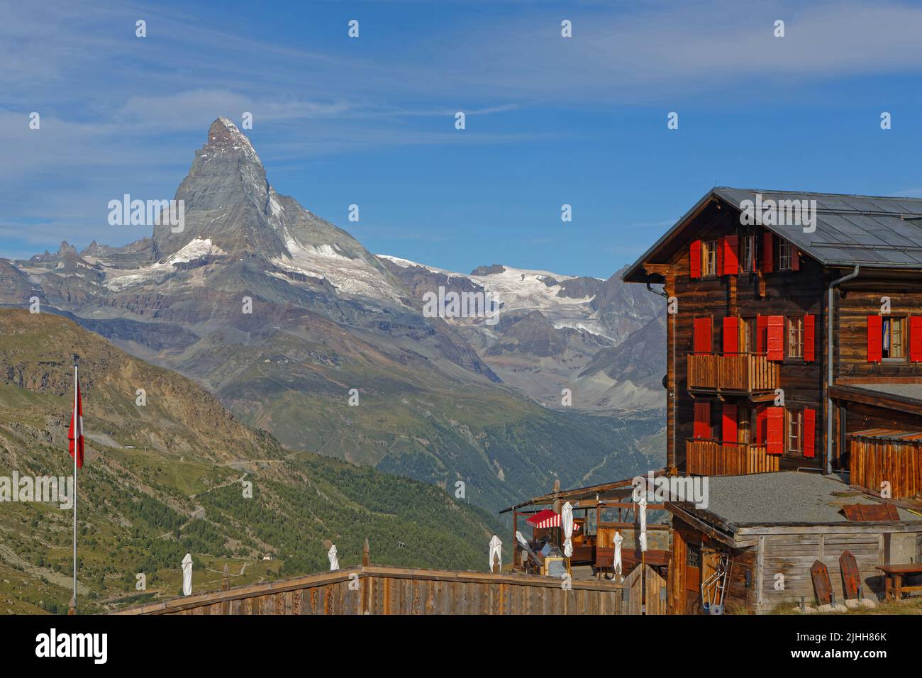 ZERMATT, SWITZERLAND, July 13, 2022 : Fluhalp refuge and Matterhorn summit. Zermatt is famed as a mountaineering and ski resort of the Swiss Alps. Stock Photo