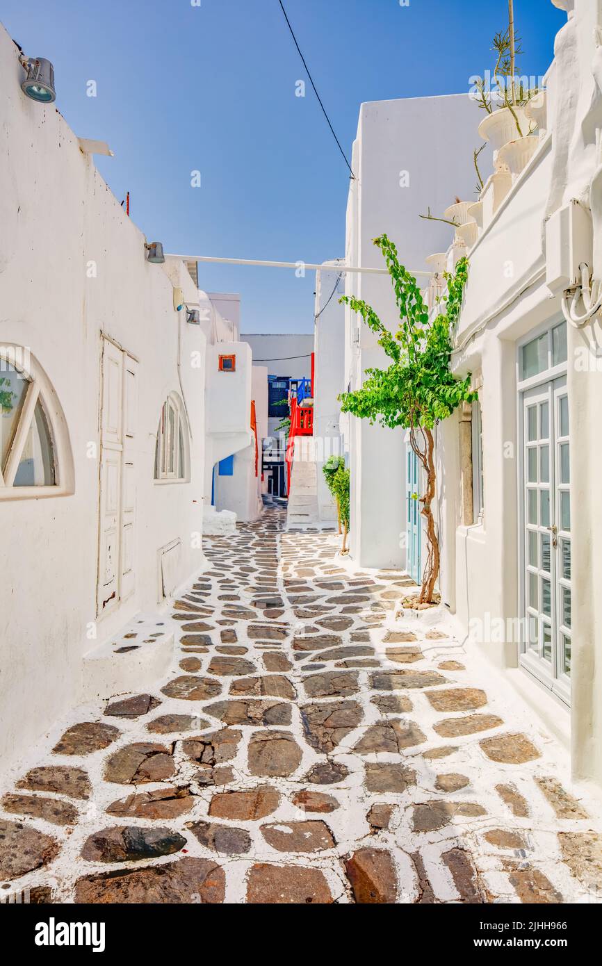 Street In Mykonos Town Between White Houses Stock Photo Alamy