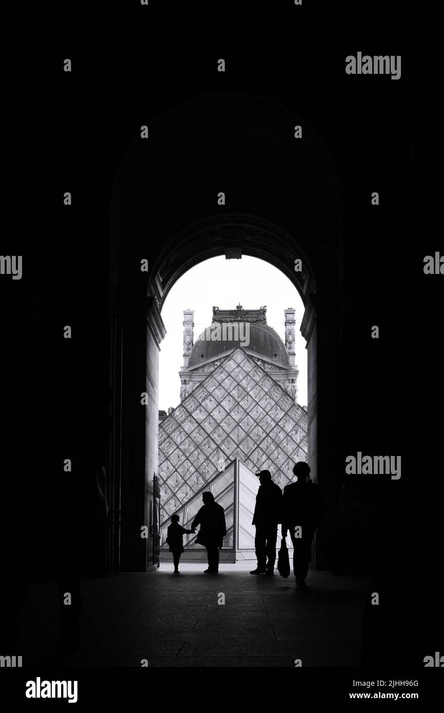 Pyramid of The Louvre Museum (The Grand Louvre) in Paris which is one of the world's largest museums and a historic monument. Stock Photo