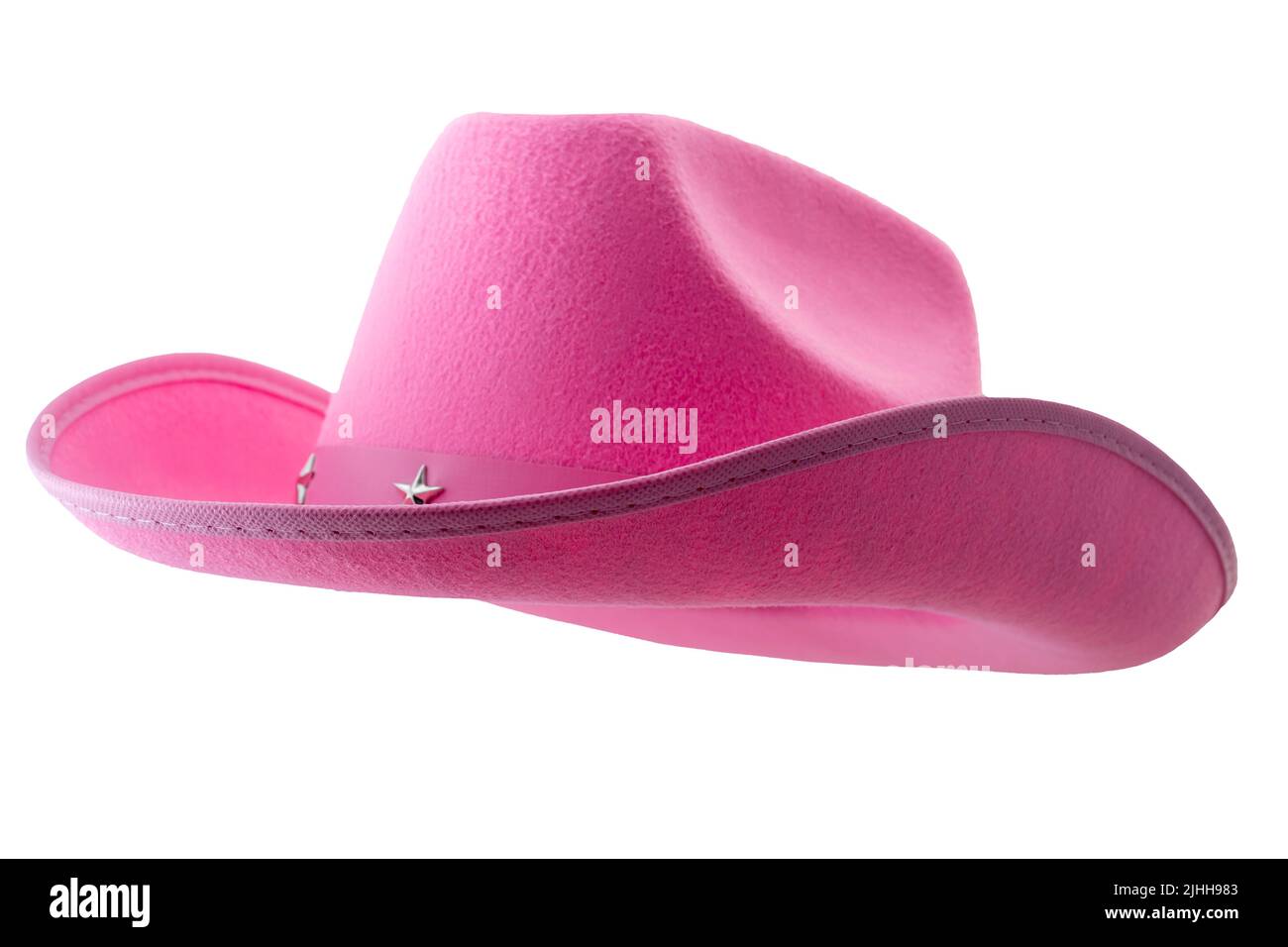 Pink cowboy hat isolated on white background with clipping path cutout concept for feminine western attire, gentle femininity, American culture  and f Stock Photo