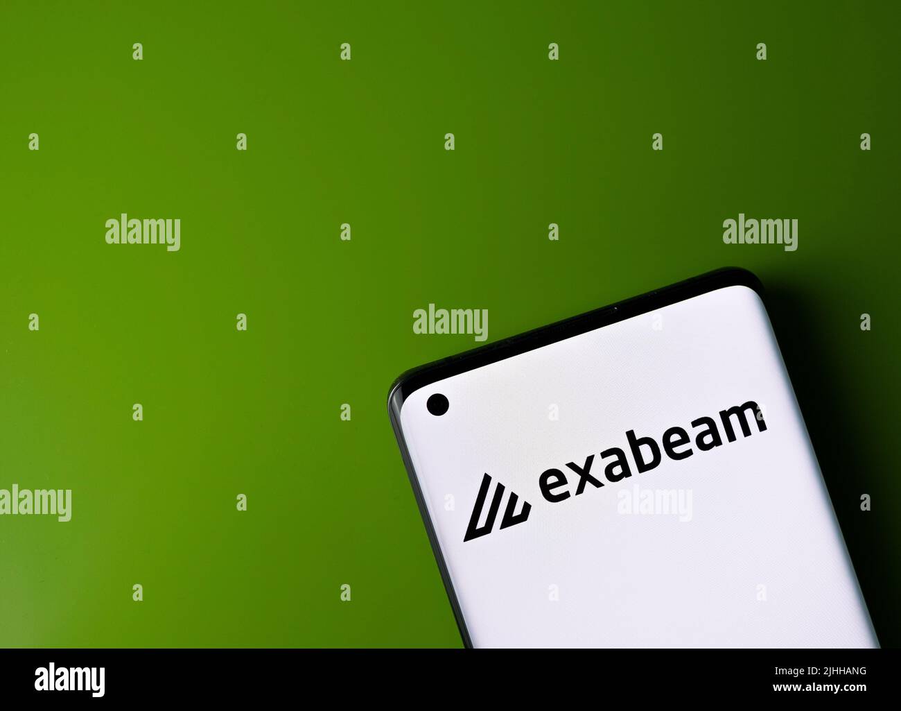 Exabeam logo seen on smartphone screen with copy space. Stock Photo