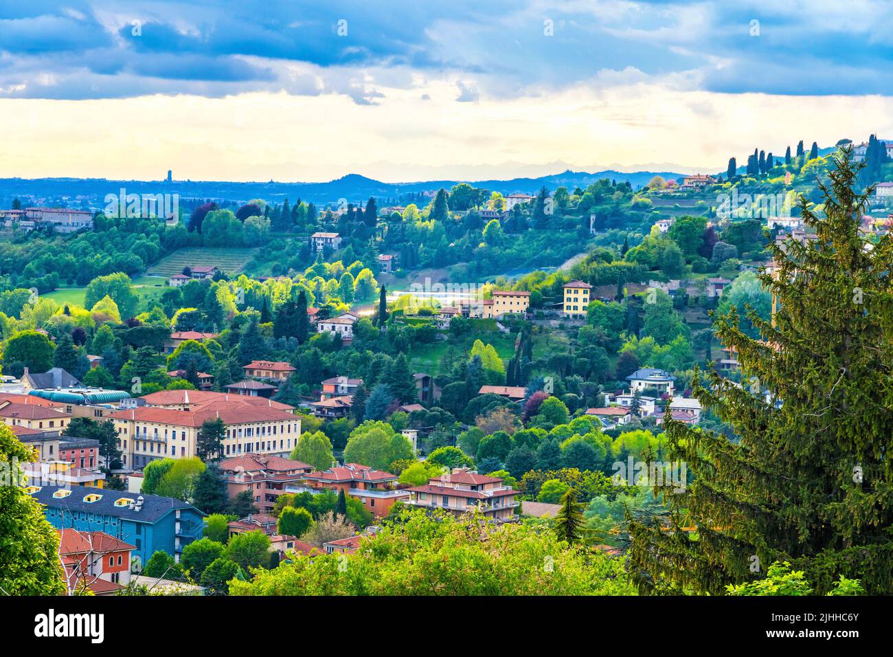 Picturesque aerial spring view of outskirts of Bergamo city, Italy. View from Parco di San Giovanni Stock Photo