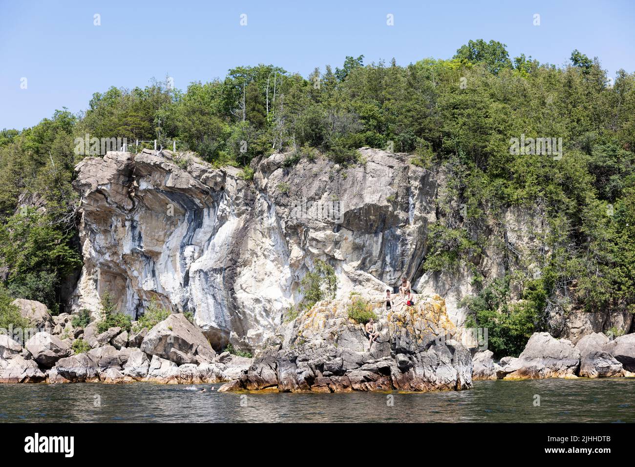 Lone Rock Point, a popular spot for swimming, diving, rock climbing, and hiking on Lake Champlain in Burlington, Vermont, USA. Stock Photo