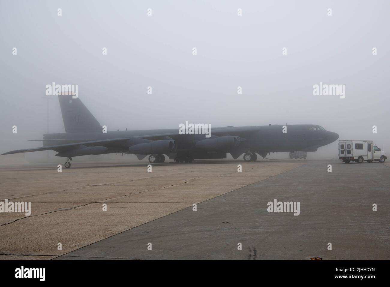 A B52H Stratofortress sits on a flight line preparing for flight at Minot Air Force Base, North Dakota, July 15, 2022. The B52H stands 45 feet tall, has a wingspan of 187 feet and the wings can flex up to 5 feet up up and down. (U.S. Air Force photo by Airman 1st class Alexander Nottingham) Stock Photo