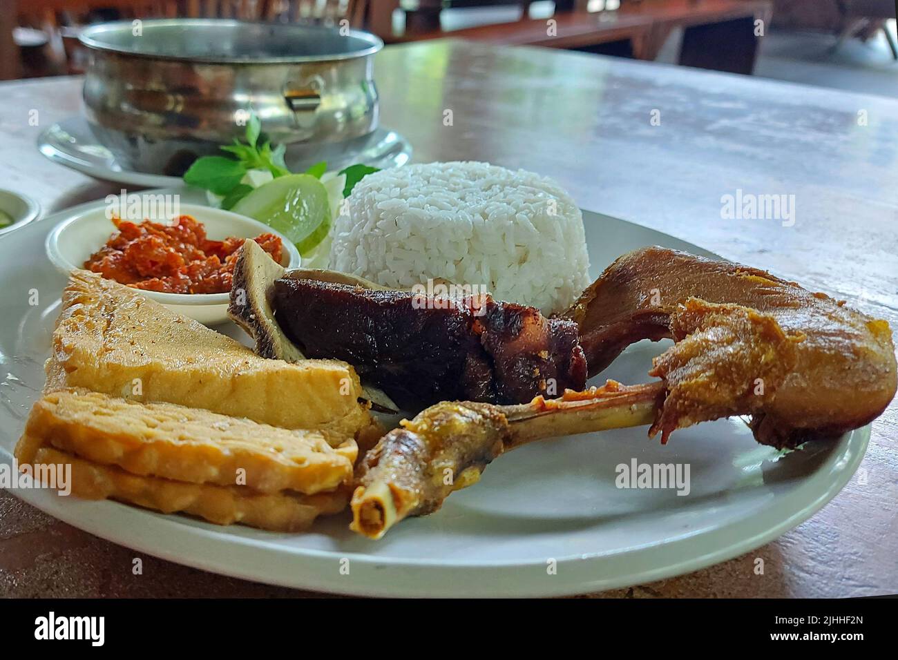 Fried Beef Ribs and Fried Chicken at Resto Jakarta, Indonesia Stock