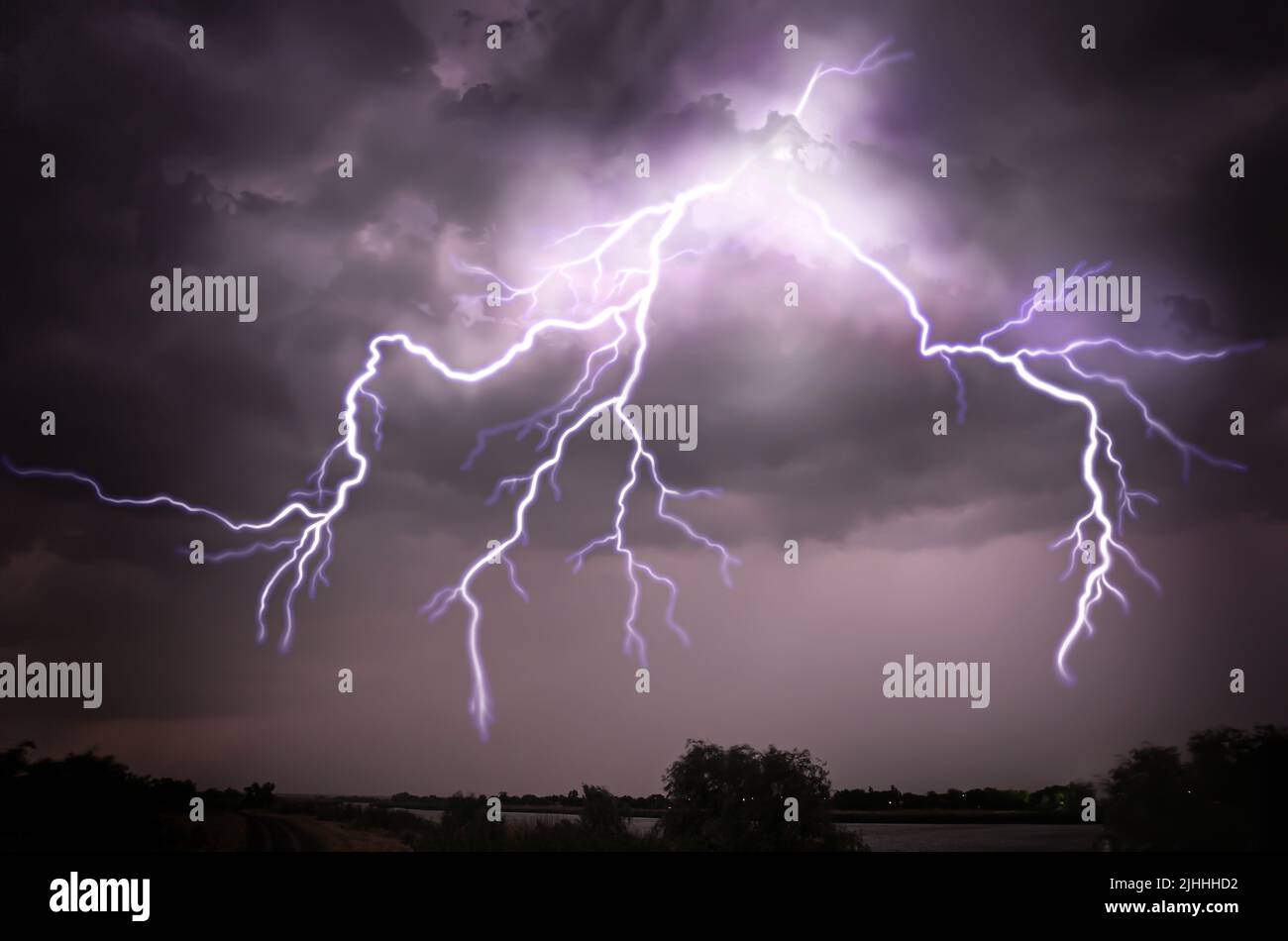 Lightning in dark sky at night Stock Photo - Alamy
