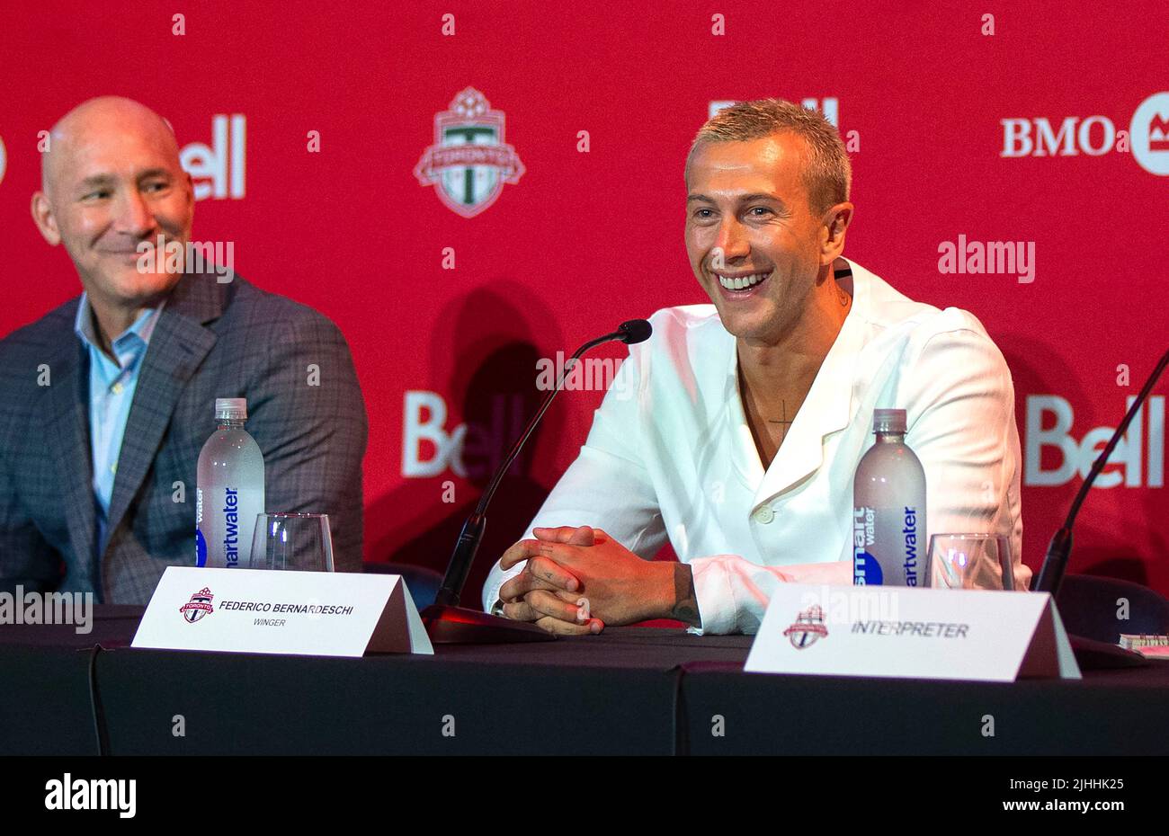 TORONTO, July 19, 2022 (Xinhua) -- Federico Bernardeschi (R) of Toronto FC attends a press conference in Toronto, Canada, on July 18, 2022. The Major League Soccer team Toronto FC held a press conference on Monday to introduce its lastest 28-year-old Italian former Juventus winger Federico Bernardeschi. (Photo by Zou Zheng/Xinhua) Stock Photo