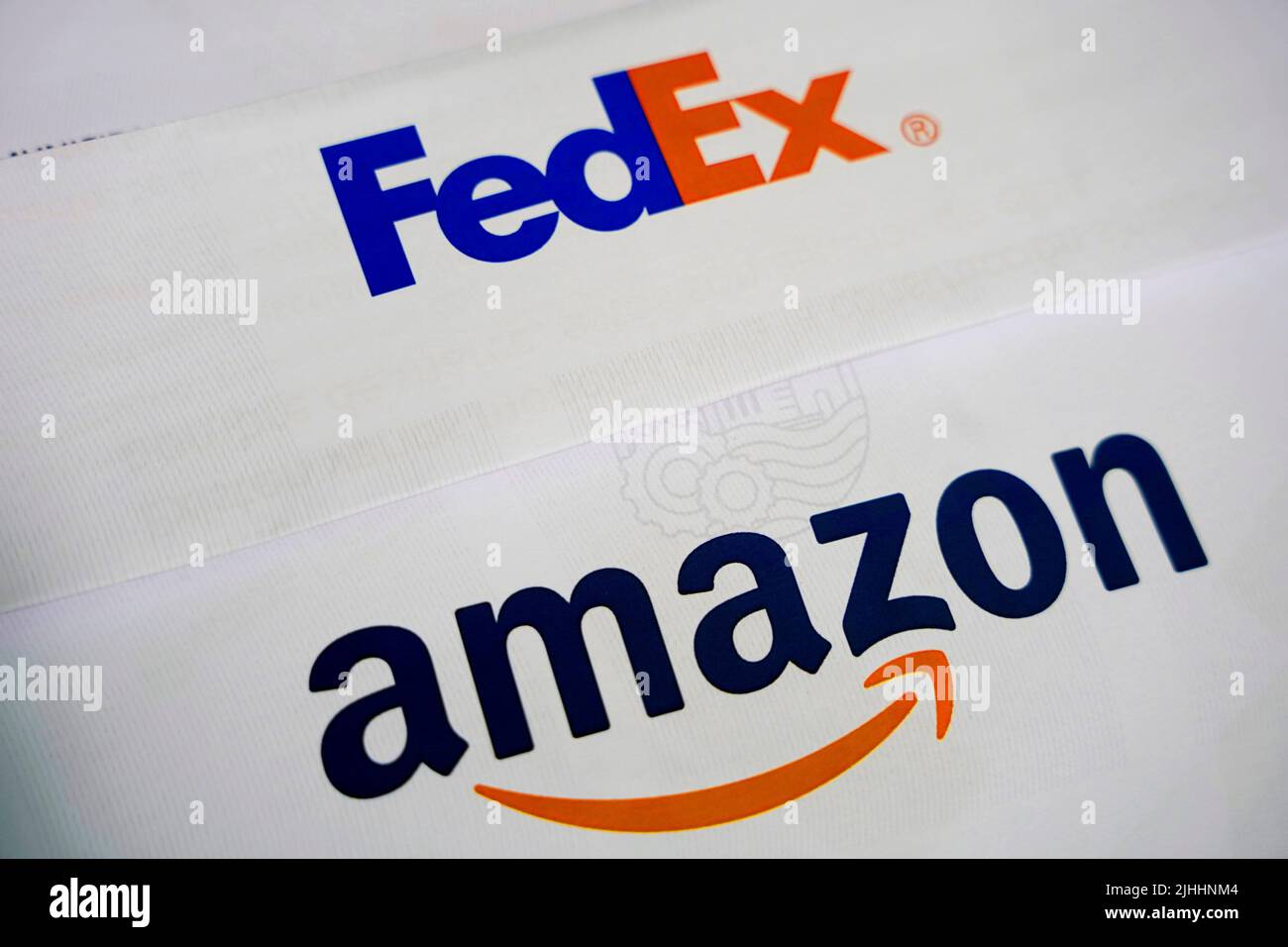 FedEx and Amazon logos on delivery packages. This editorial image ...