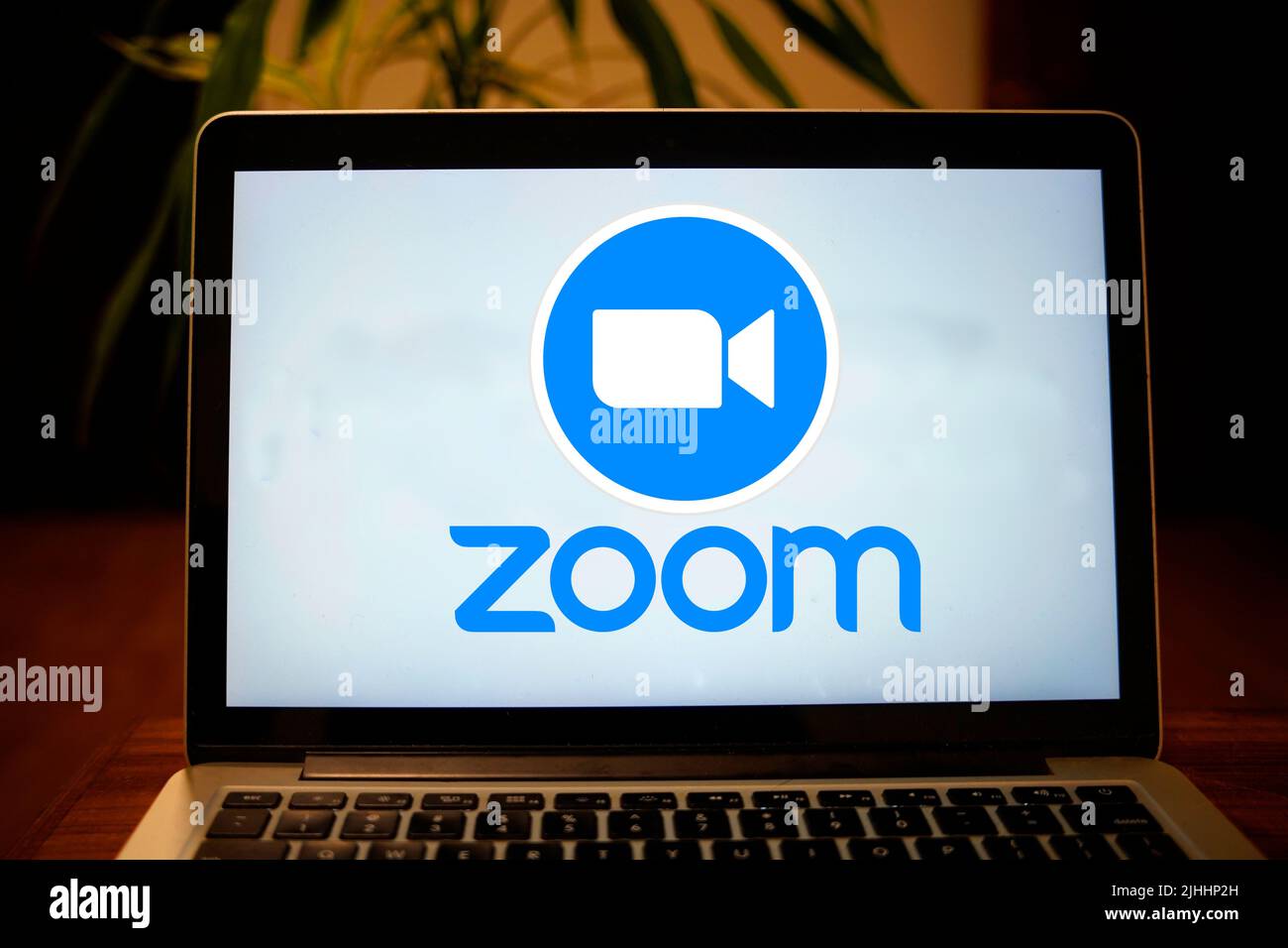 Close-up of the Zoom logo on a laptop screen. This editorial image ...