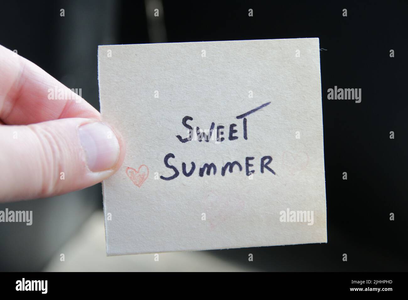 Sweet summer. Creative concept. A tag with the inscription. Stock Photo