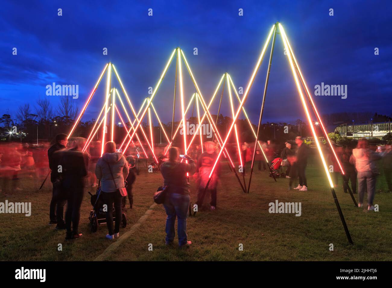 Light tube sculptures in a park in Auckland, New Zealand, during celebrations of Matariki, the Maori new year Stock Photo