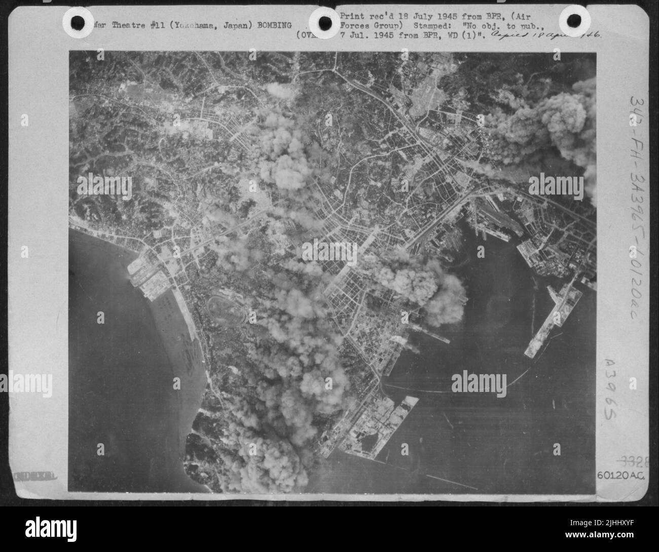 This Photograph Was Taken From 19,000 Feet Above Yokohama, Japan, During The Mission Of 29 Nov., 1945, Showing Smoke Billowing Up From Numerous Fires Set By Superfortress Incendiary Bombs. Stock Photo