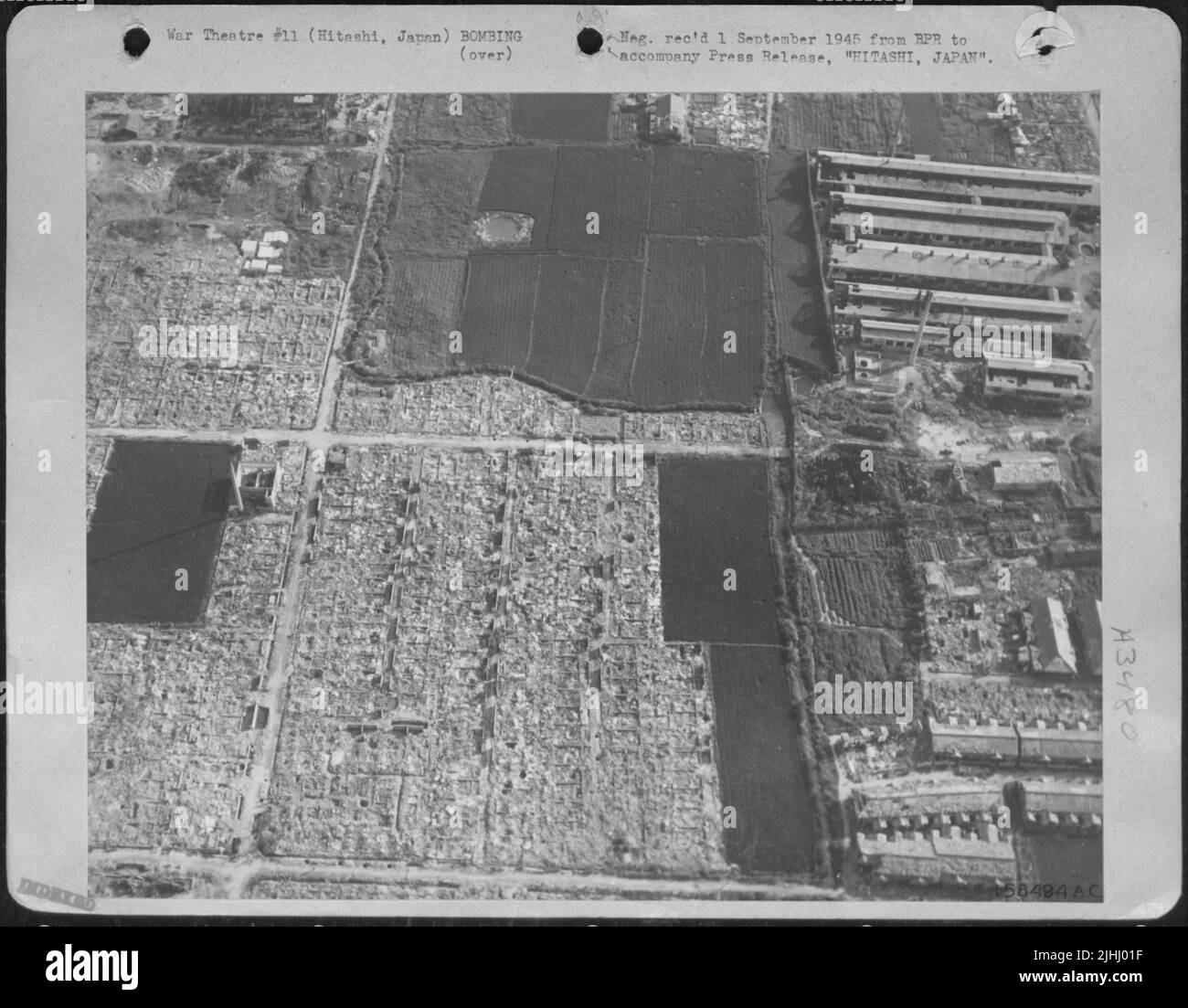 Whole Sections Of The City Of Hitashi, Japan Have Been Completely Destroyed By The Incendiary Bomb Assaults Of B-29 Superfortresses In The Closing Days Of The War [Crossed Out: 'These New Aerial Photos Show.''These New Low-Level Pictures Were Made Within Stock Photo