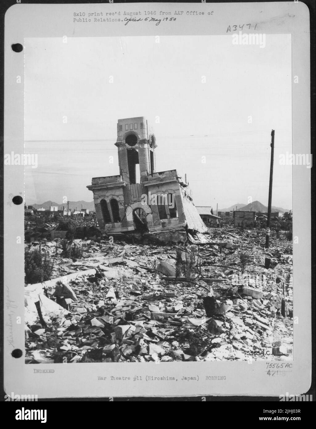 One Year After The Dropping Of The First Atom Bomb, Hiroshima, Japan, Is Still A Town Of Rubble And Debris. This Steel Frame Building Stock Photo