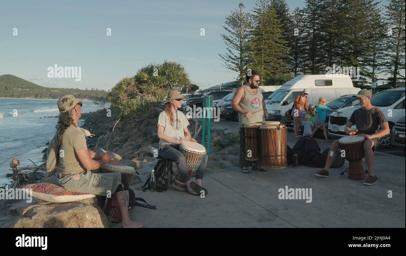 BYRON BAY, AUSTRALIA - NOV 3 2021: wide shot of a drum ensemble playing african drums at byron bay Stock Photo