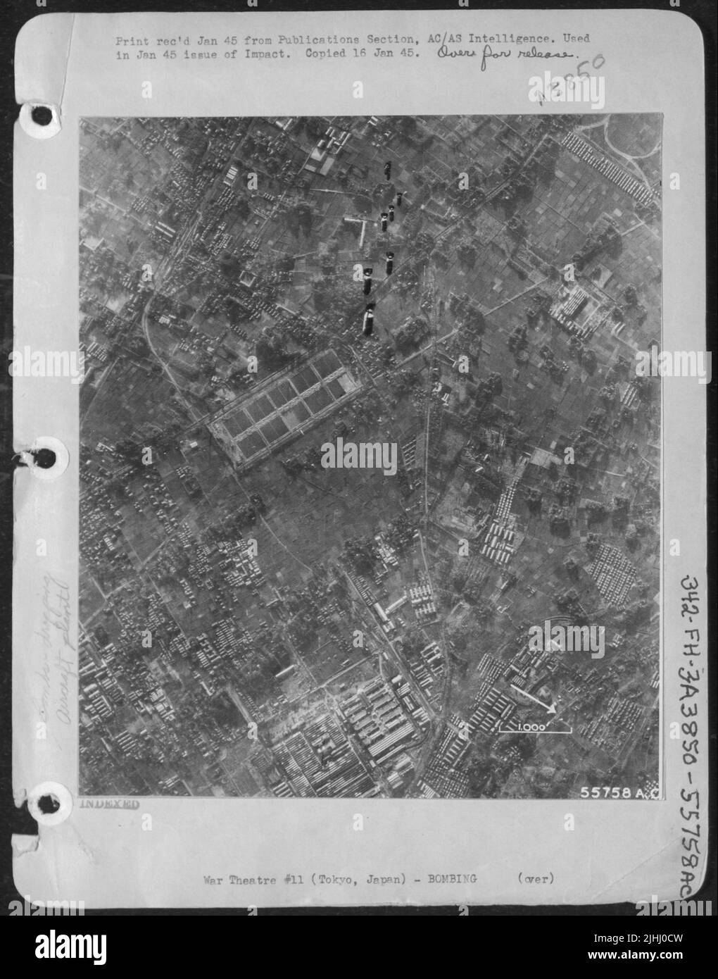 Bombs over Tokyo, Japan on 24 November 44 plunge towards the primary target Stock Photo