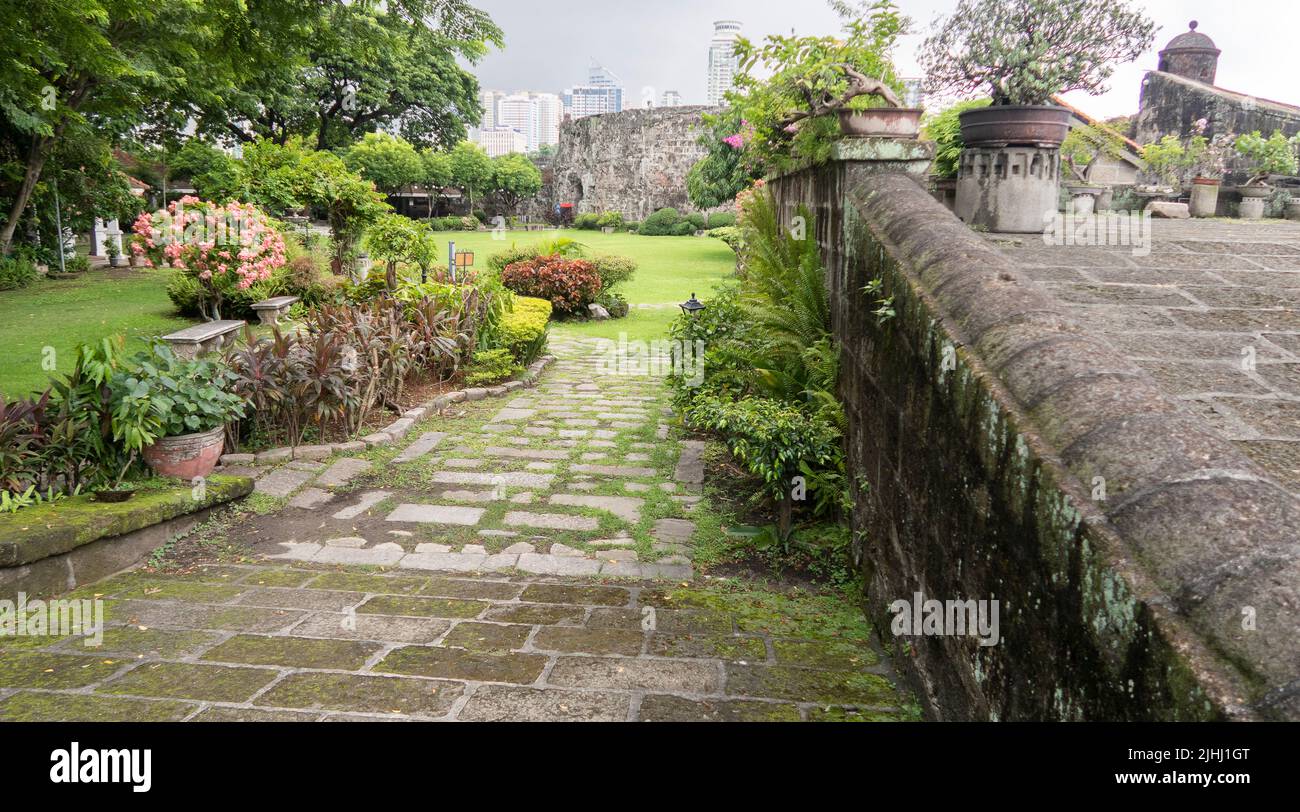 Old-world Intramuros is home to Spanish-era landmarks like Fort Santiago, with a large stone gate and a shrine to national hero José Rizal. The ornate Stock Photo