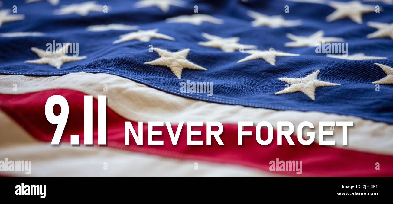 Patriot Day. 9 11 USA Never Forget. White text on United States America flag background. Remember September 11, 2001. Stock Photo