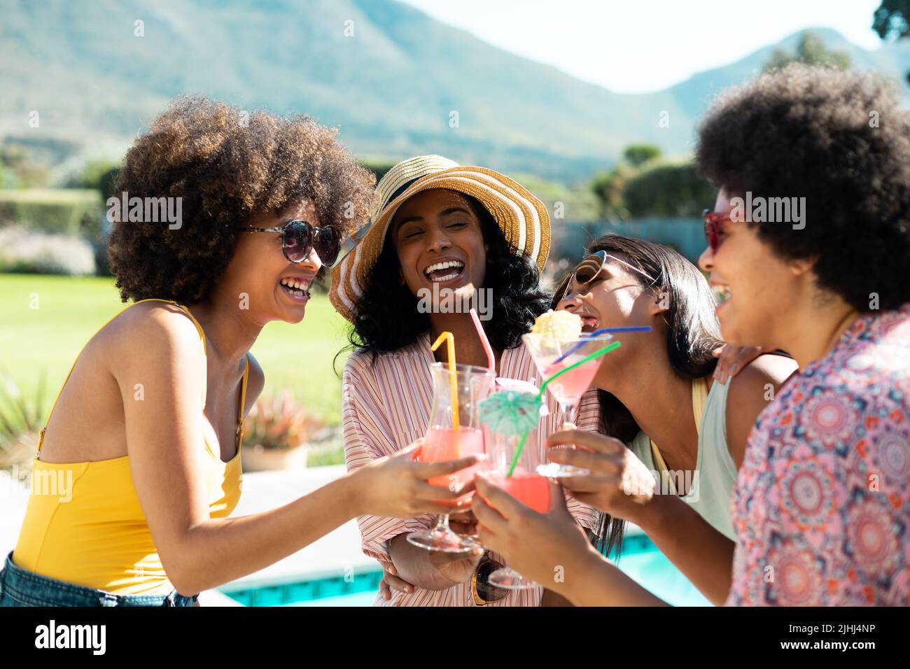 Pool party with sangria pitcher, fruit cocktails and refreshments by the  swimming pool. Summer lifestyle, topical vacation, fun and relaxation theme  Stock Photo - Alamy