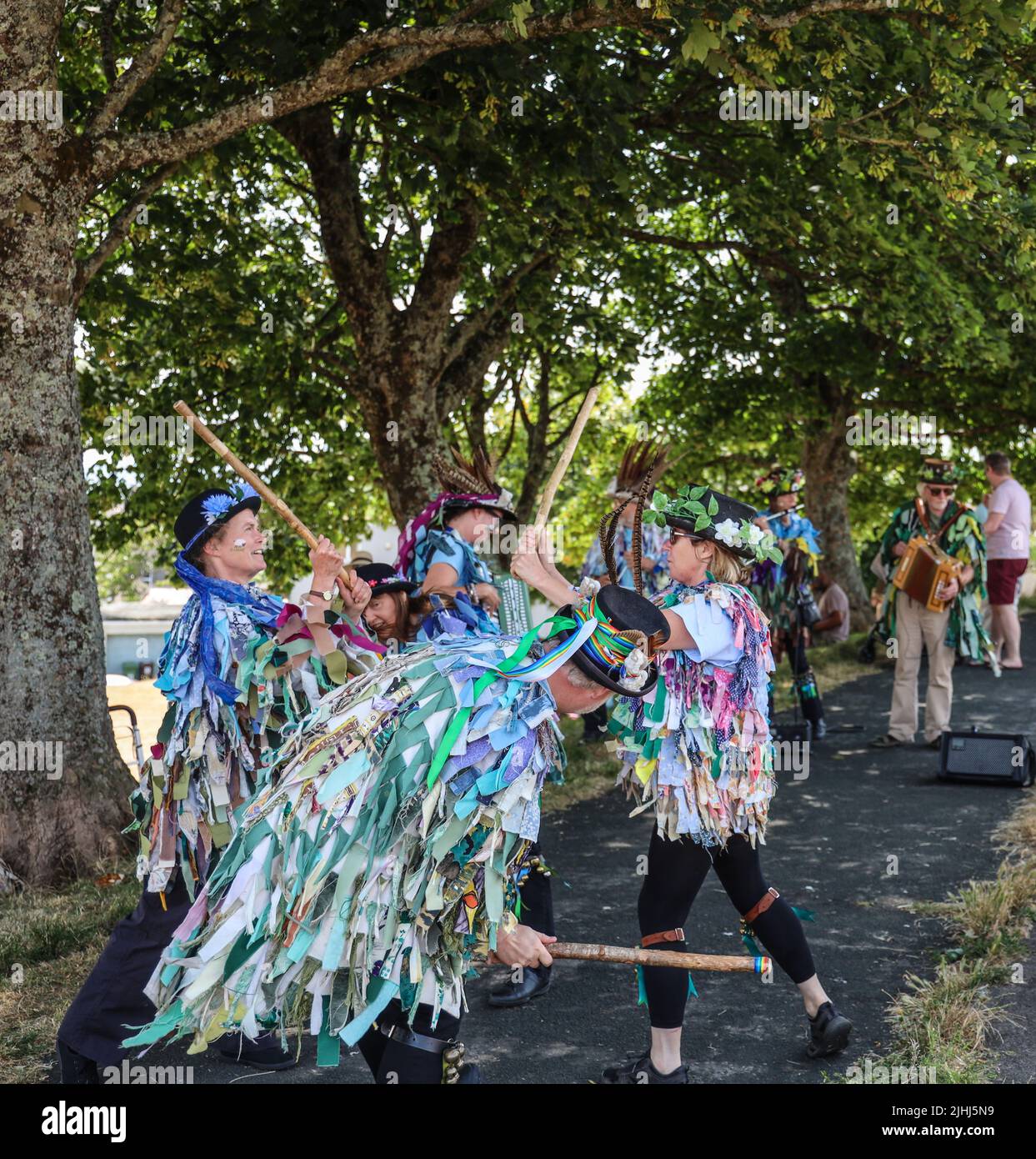 Dartmoor Border Morris, in full flight at the Blockhouse Park as a part of the Stoke Village (Plymouth) Fun Day. Stock Photo